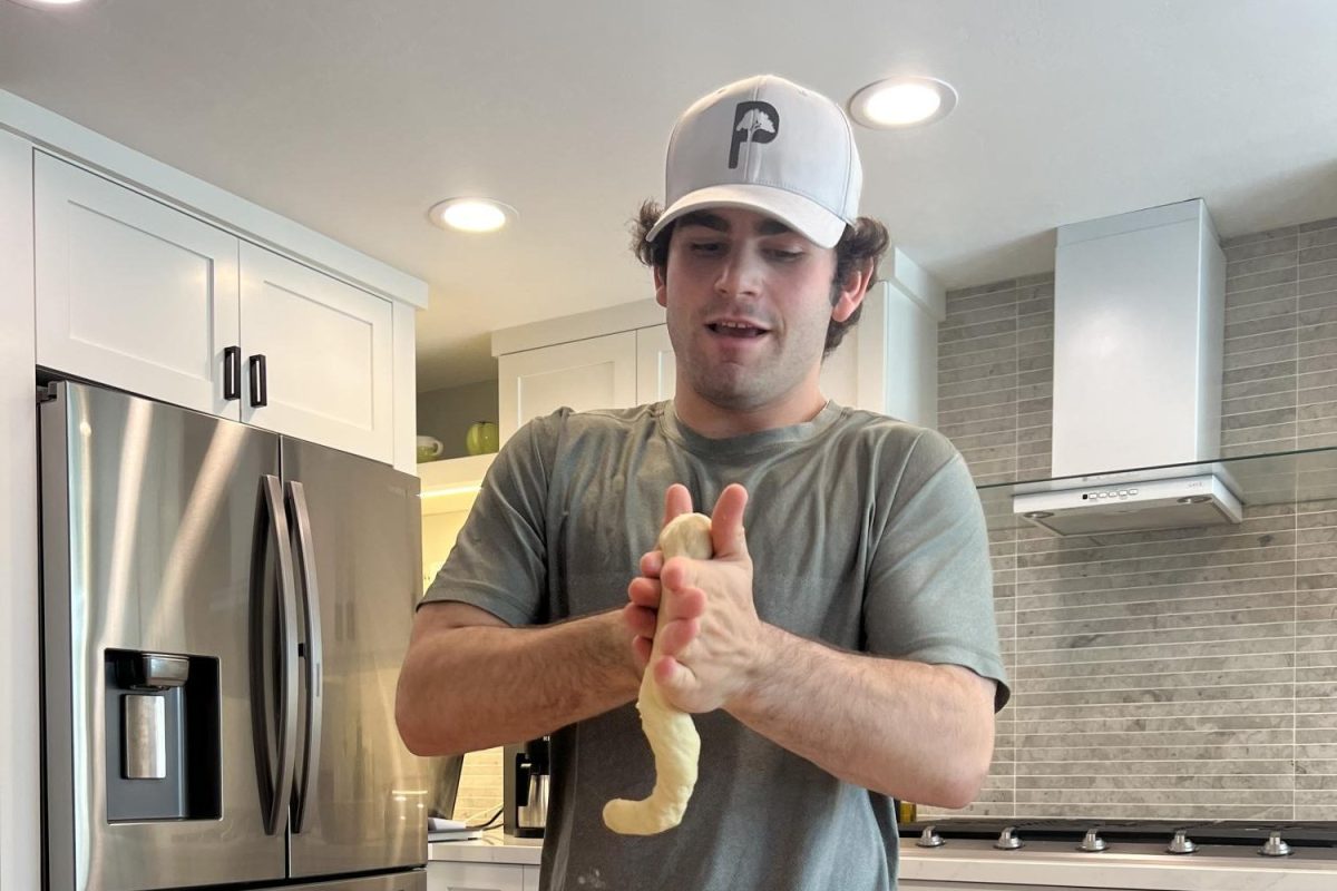 Alex Weinstein (12) rolling the dough for his challah business. Over the summer, Weinstein ran his business and sold e-bikes at the San Diego County Fair. Photo courtesy of Alex Weinstein