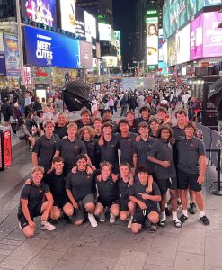 The football team poses in Times Square, New York. They fell to Freedom High School after a tough 14-17 loss. Photo courtesy of Cruz Rodriguez. 