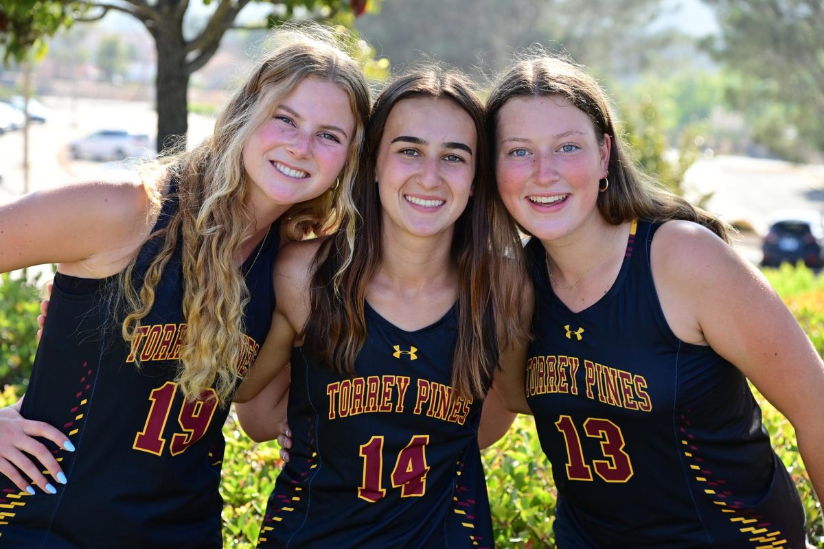 Sydney Meltzer (12) is a starting  captain for the varsity field hockey team this season. Meltzer was named the first female Athlete of the Month for this school year. Left to right: Morgan Christie (11), Sydney Meltzer (12) and Kara Dunlap (11). Photo courtesy of Anna Scipione. 