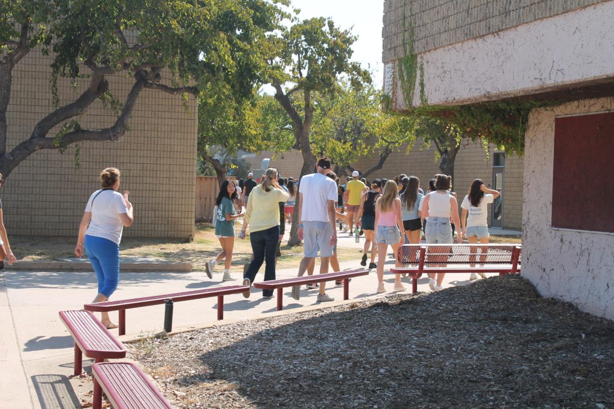 Students, teachers and other community members walk around campus in recognition of Suicide Prevention Month. The school’s Yellow Ribbon Week took place from Tuesday, Sept. 3 to Friday, Sept. 6.