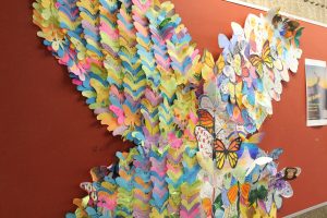 Students last year created butterflies during student connection time. Now, they are put together for all to see in the B building.