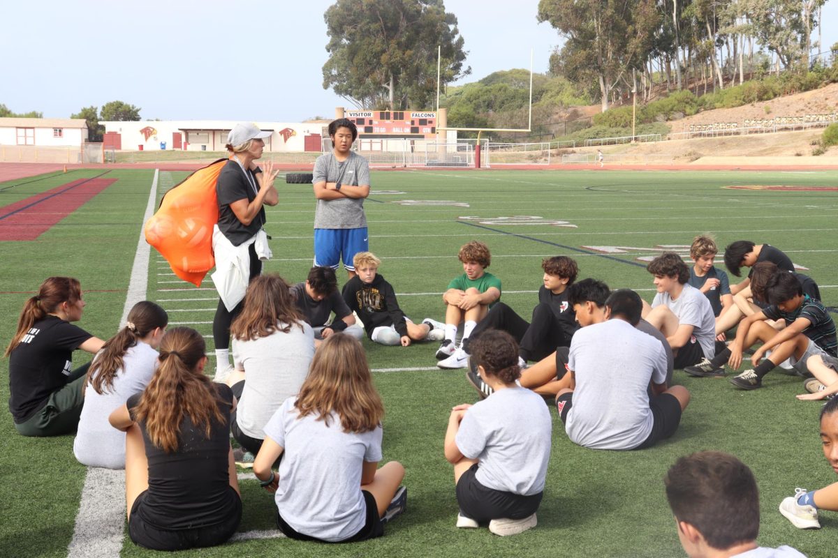 Lacey Sovacool, Weight Training, Dance PE and Year One PE/Health teacher at the school, instructs her students on the Ed Burke Field. Last school year, Sovacool taught at San Dieguito Academy. 