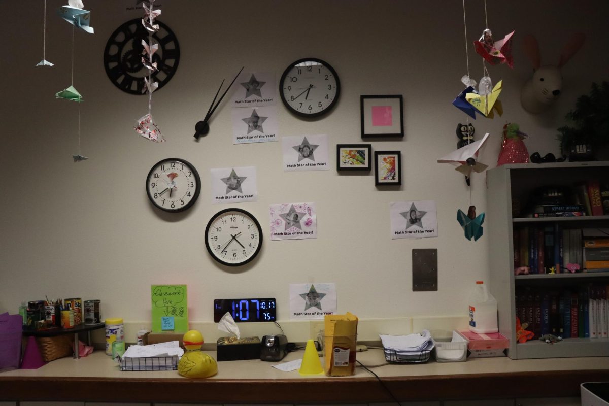 Math 2/3 Honors teacher Kristina DeVico has several analog clocks in her room, each frozen in place and telling a different time. DeVico explained that the clocks symbolize how in honors math classes, students feel like they are on a time crunch, but in reality, the stress is all in their heads.