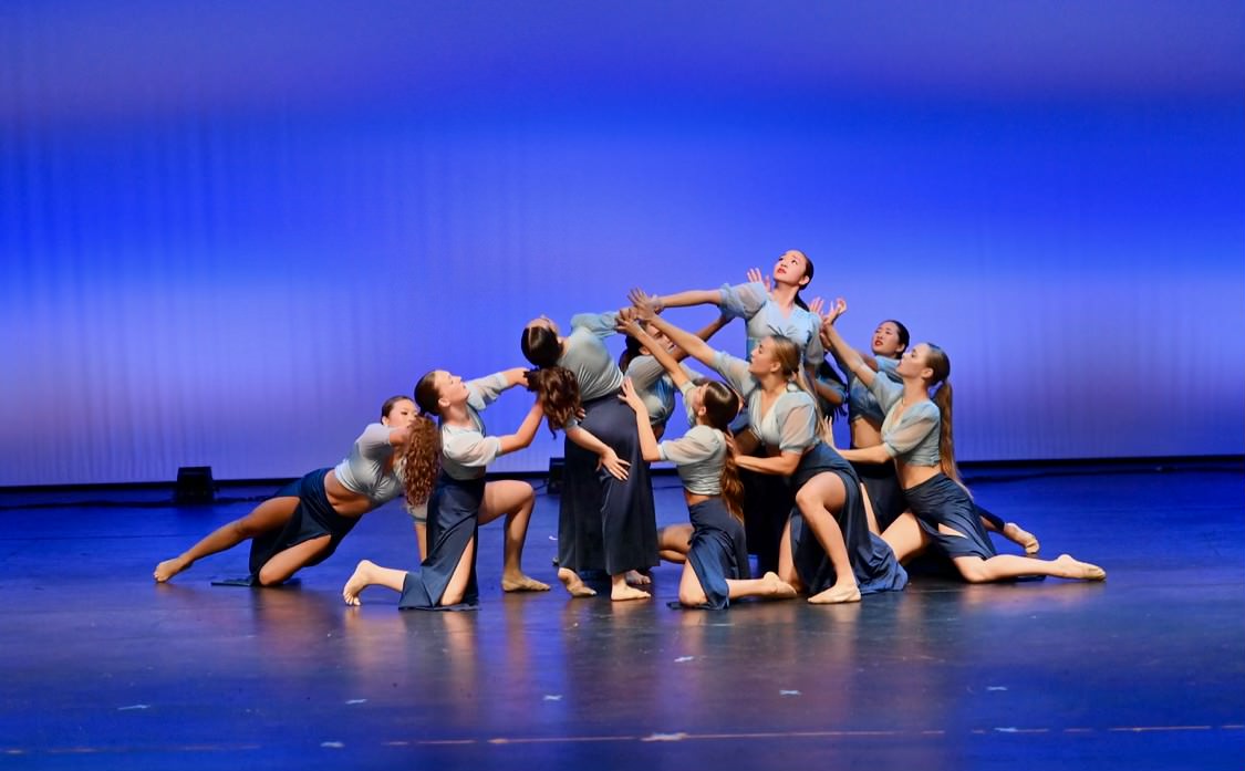 The varsity lyrical team performs in the second-half of the Fall for Dance concert. Dressed in lyrical dance costumes, the team danced to 