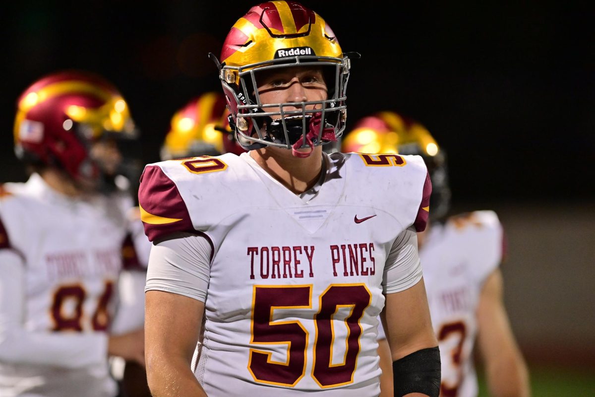 Will Schreckengaust (12) plays against Carlsbad High School (7-3) on Oct. 18. He was named the October male Athlete of the Month. Photo courtesy of Anna Scipione.