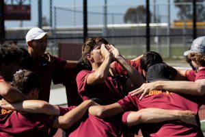 The boys varsity tennis team huddles up before a match. After the 2024 season, complaints were filed against TPHS administrators and certain CIF officials. Photo courtesy of Robert Freedman.