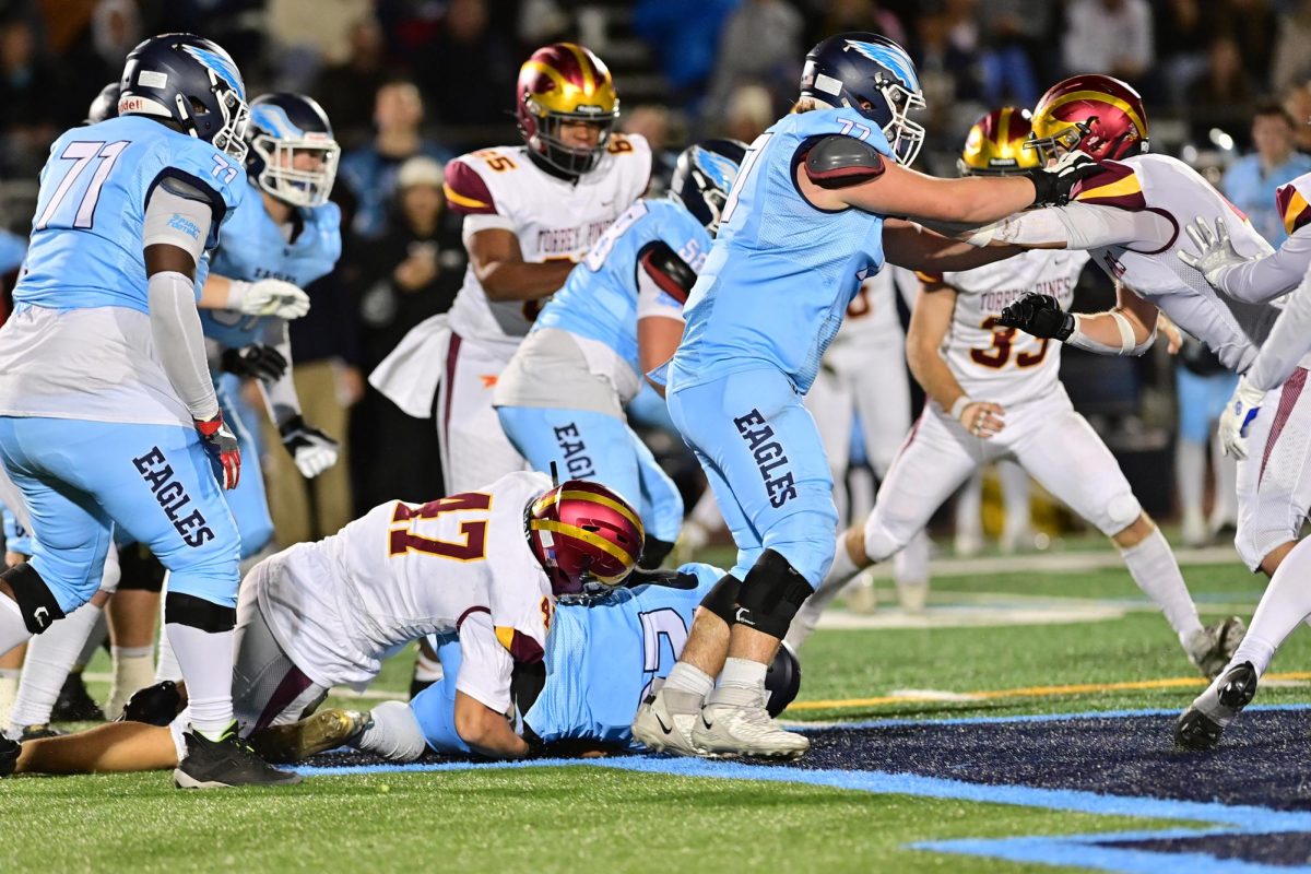 The varsity football team (5-7) puts up a fight against Granite Hills High School on Nov. 15. The team lost in the CIF Division I quarterfinals this year. Photo courtesy of Anna Scipione.