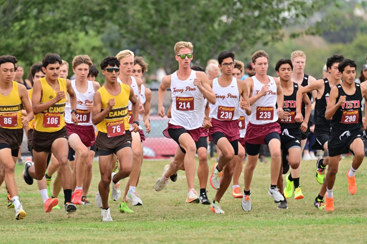 Captain Ryan Chelesnik (12) leads the team at a cross-country meet. Chelesnik recently committed to California State University, San Marcos to further his academic and athletic career. Photo courtesy of Ryan Chelesnik.