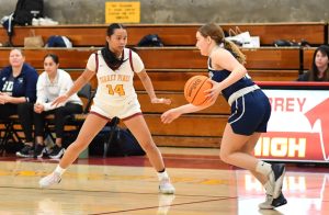 Lily Oliva (12) has her eye on the ball, moving on her feet. Oliva was named the December female Athlete of the Month. Photo courtesy of Lily Oliva.