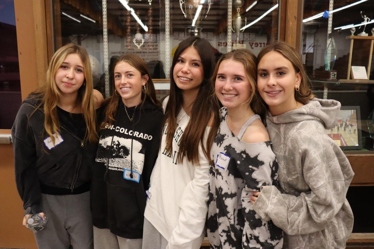 Participants huddle for a picture. The event consisted of interactive and engaging activities that allowed students to connect and achieve a sense of belonging. Left to right: Mackenna Morales (10), Riley Smith (10), Gabriella Topp (10), Stella Roca (10), Ella Gataric (10)