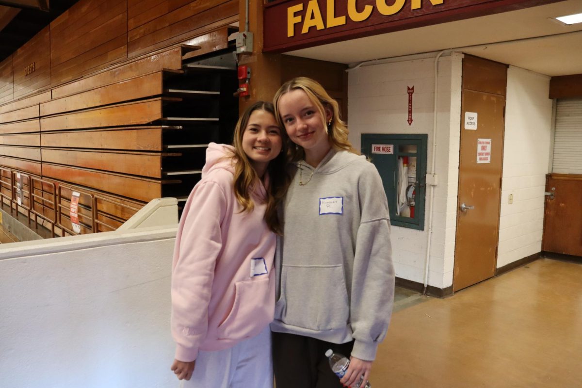 Participating students smile for a picture. Students from all grade levels participated in the event. Left to right: Reese Rogowski (9) and Kingsley Romande (9).