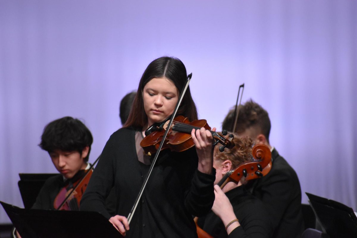 Mila Keres (11) performs in the 2023 winter concert. Keres started playing the violin in second grade. Photo courtesy of TPHS Music Department.