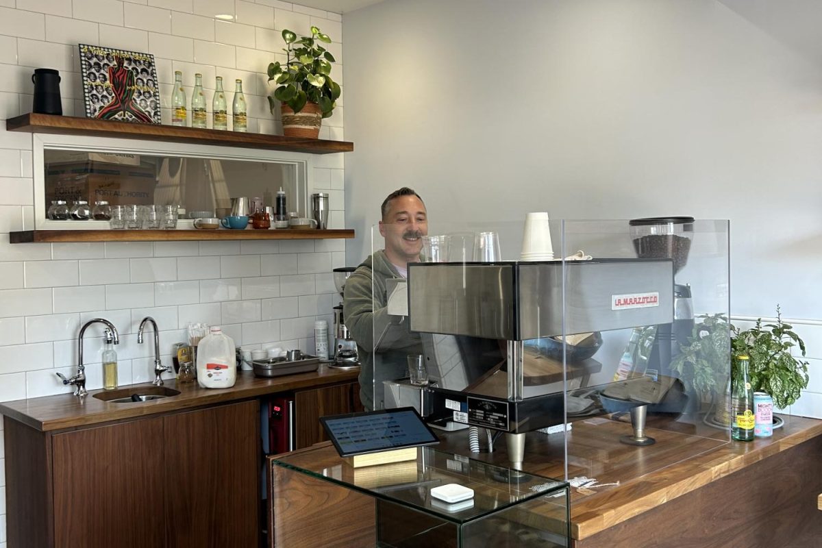 Little Joy coffee bar owner, Drew Jeglinski makes a handcrafted iced latte. Little Joy opened in 2019 and has been Del Mar local's favorite coffee shop since. 