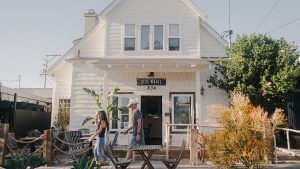 Stationed in a breezy white cottage off the coast in La Jolla, Blue Whale Cafe is the perfect place for locals and tourists to get a taste of sunny California.  The cafe adapted boho-surfer aesthetic for their West Coast visitors when they opened in Oct. 2023. Photo courtesy of La Jolla.