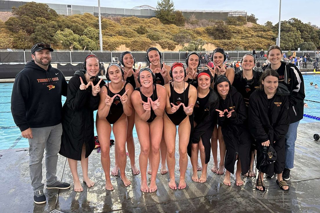 The varsity girls water polo team (18-12) holds up a big 'W' after making program history. Defeating Grossmont High School (18-9) on Feb. 18, this was the first time in girls and boys program history that a team won a CIF Open Division playoff game. Left to right top row: Brandon Carman, Madeline James (10), Lily Greene (9), Ryland Smith (12), Finn McNamara (11), Madeline Fletcher (10), Brianna Warren (10) and Taylor Arnett. Left to right bottom row: Eva Petroski (9), Jazmyn Modir (10), Audrey Kormylo (12), Campbell Bushh (12), Kaiah Smith (10) and Ella Gataric (10). Photo courtesy of Ella Gataric.