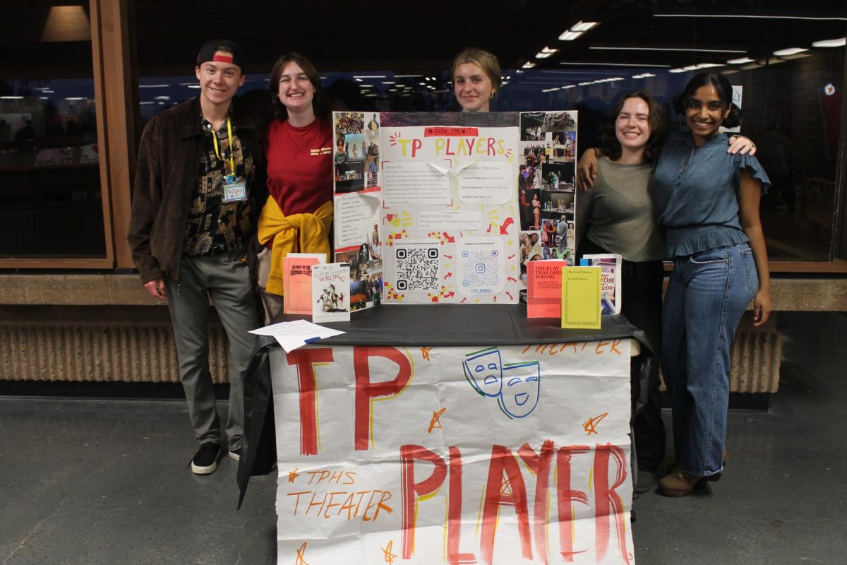 TP Players present their booth. The event included booths from extracurricular programs as well. Left to right: Nolan Greer (12), Stanley McInnis _, 