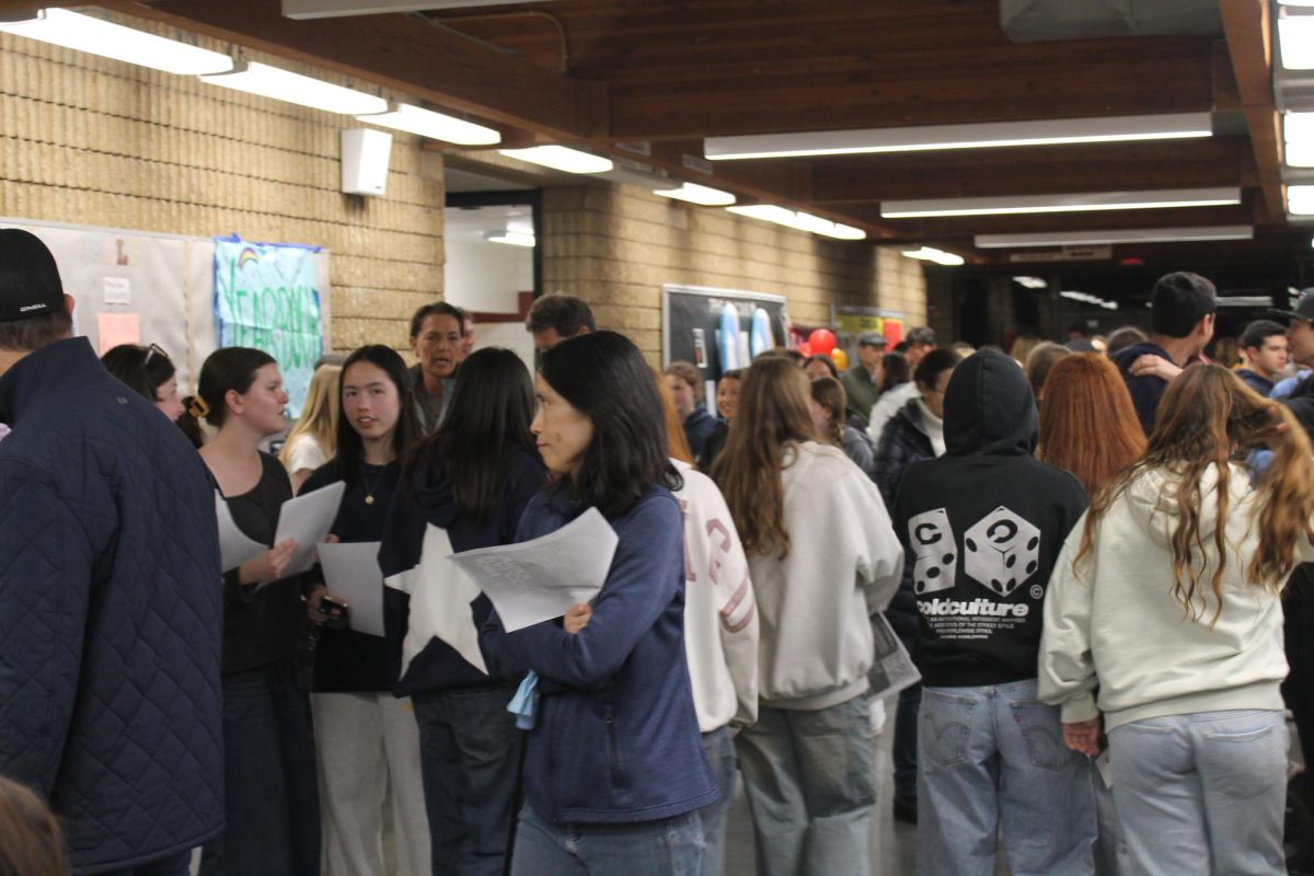 Incoming freshmen walk around the upper-level of the B Building, exploring different booths and finding programs that spark their interest. The event took place from 6 p.m.