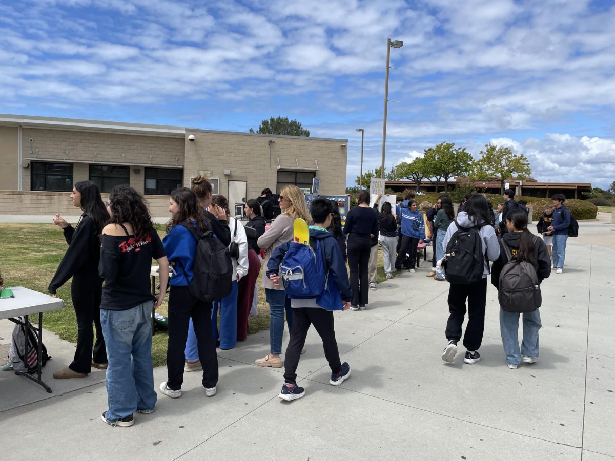 Students walk around the quad at lunch during the Club Fair. This year, the school celebrated ‘We Are TP’ Week from April 14 to 18.