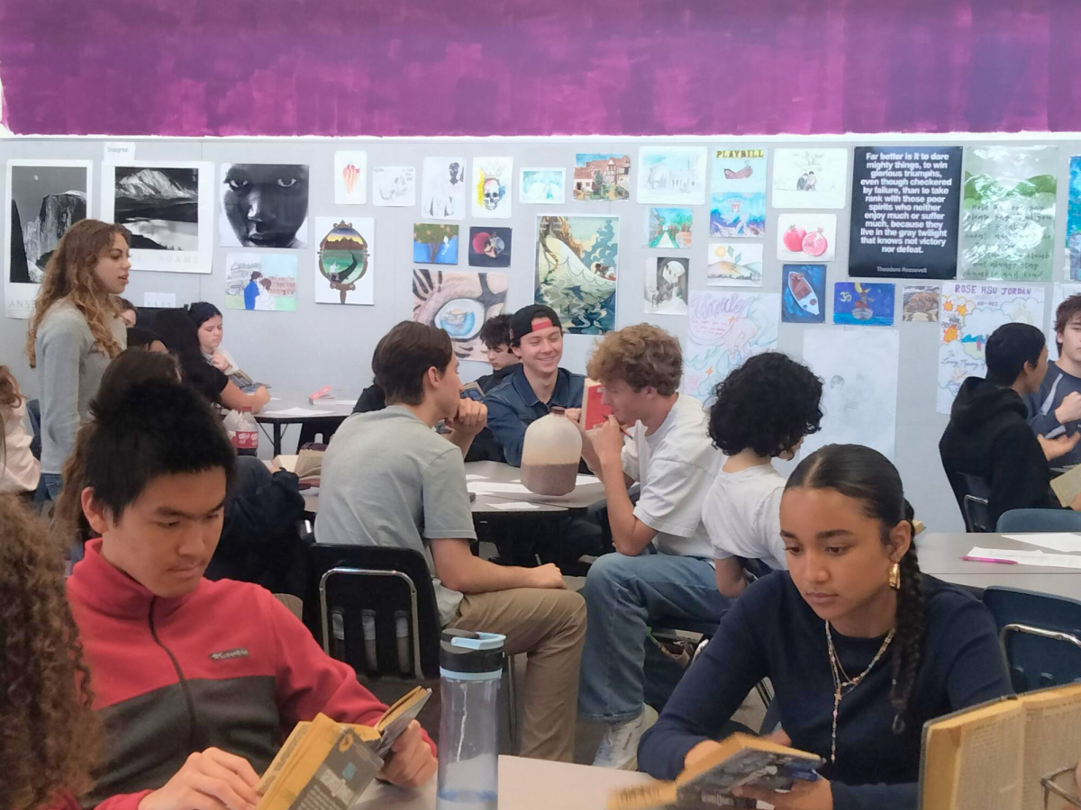 Seniors from Sara Boozer's AP Literature and Composition class participate in discussions and do classwork. As May 1 approaches, more seniors have committed to colleges or post-high school plans.