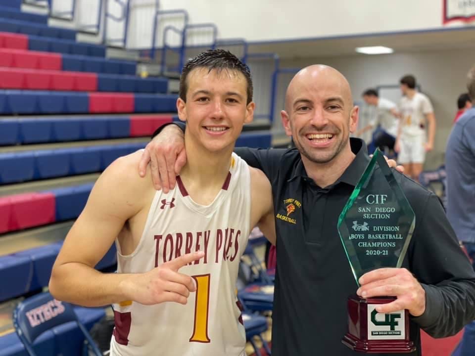 Now as a teacher, Nicholas Diaz ('10) poses with an athlete after winning the CIF  Open Division Championships. Diaz returned to the school as a special education teacher and assistant basketball coach after graduating. Photo Courtesy of Nicholas Diaz.
