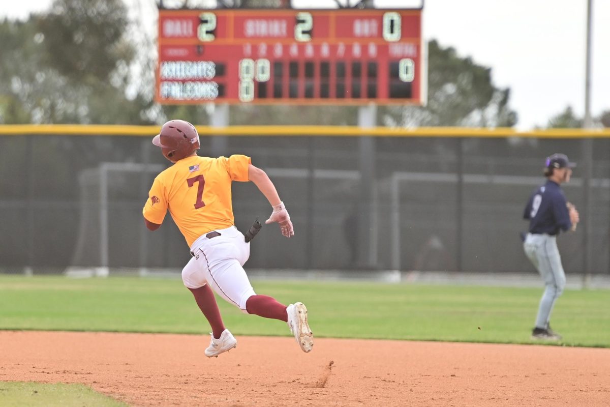 Ryder Young (12) sprints to second base. On April 25, the varsity boys baseball team (11-14) lost to San Marcos High School (16-5-1), with a final score of 7-2. Photo courtesy of Anna Scipione. 