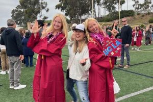 Left to right: Sophie Keller ('24), Lisa Tellers and Nataila Mochernak ('24) pose for a photo at graduation. This year, Tellers was named Teacher of the Year. Photo courtesy of Lisa Tellers.