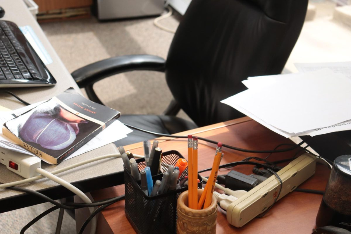 An empty teachers desk sits without its normal company. During their time at the school, many students have seen common substitutes across campus.