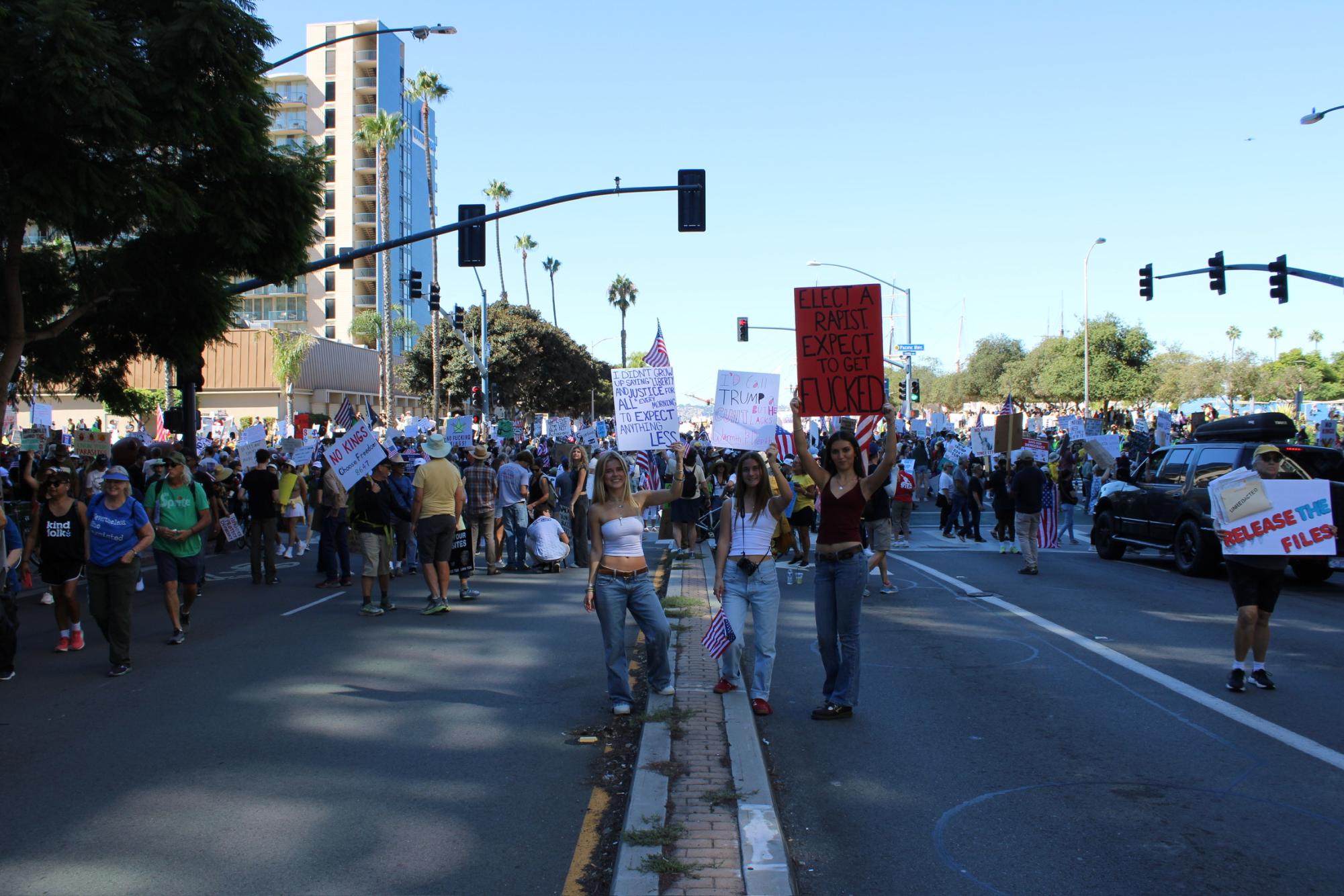 The school’s high school seniors Tess Wheatley (12), Lily Bruch (12) and San Dieguito Academy Sasha Kuhnert (12) march at the downtown "No Kings" protest. The protest was on Oct. 18, last Saturday. Photo courtesy of Polly Whatley.
