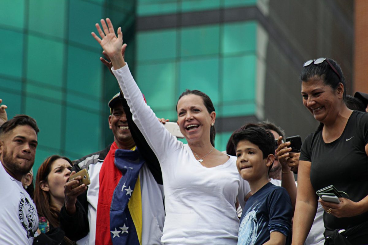María Corina Machado stands in the center of a protest march against the current president, Nicolás Maduro. She won the 2025 Nobel Prize in peace for her work to fight for democracy in Venezuela. Photo courtesy of Creative Commons.