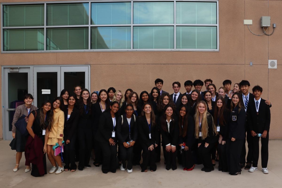 Members of the Torrey Pines DECA chapters pose for a photo. They won awards in the Business Finance series of roleplay and exam.