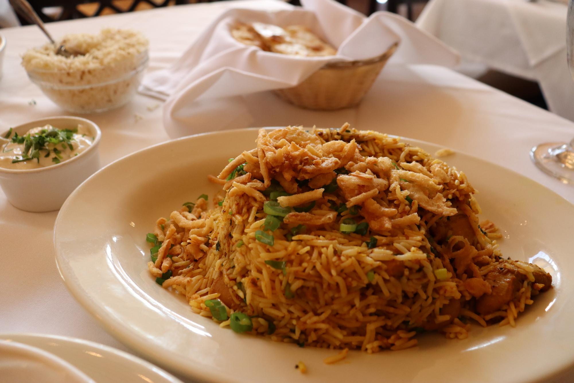 Biryani is made of rice, vegetables and meat sauteed together. Spices like cloves, tumeric, saffron and garlic were also added.