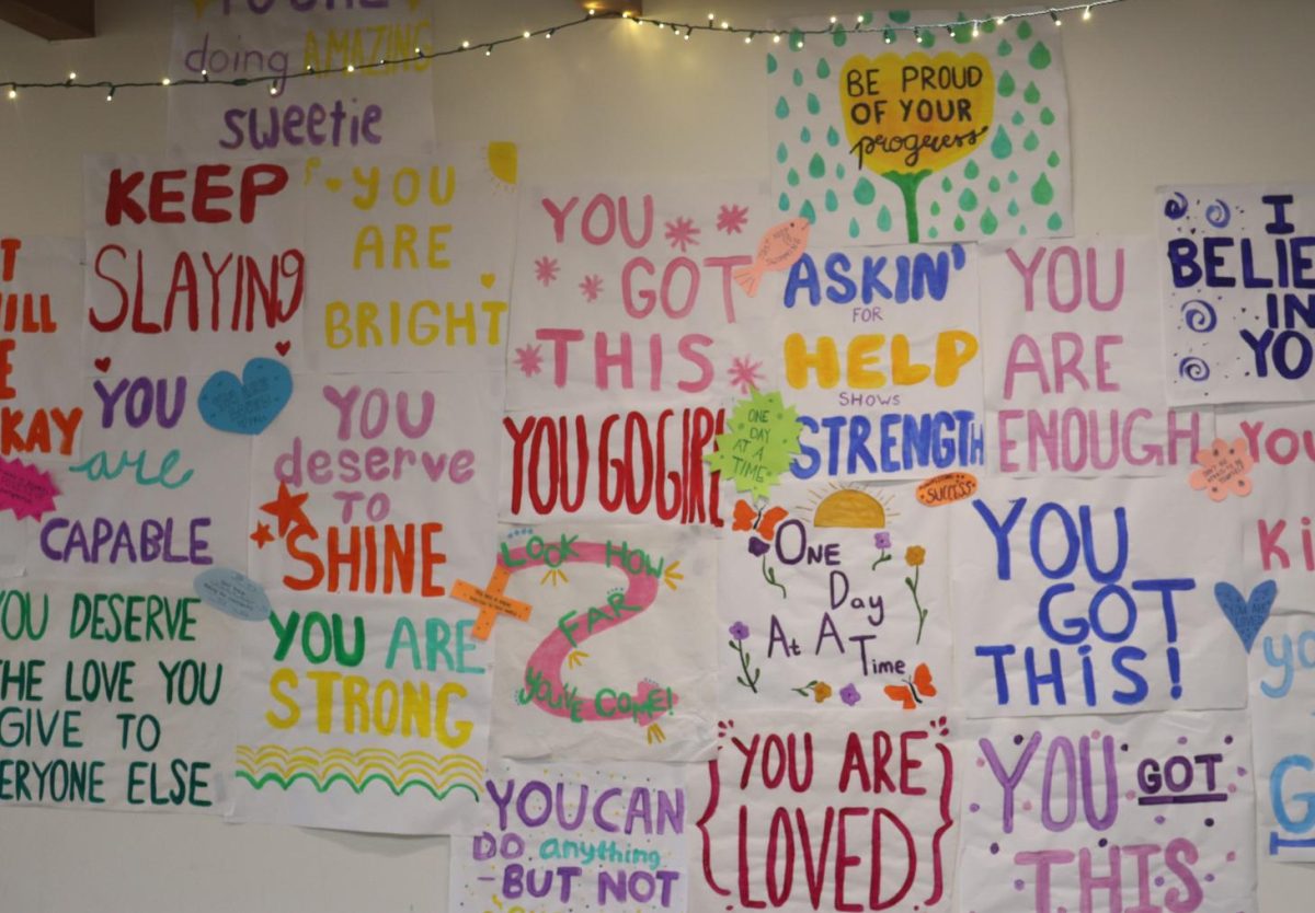 PALs hangs encouraging posters in the B Building hallways. They hosted Stress Less Week the week before finals.