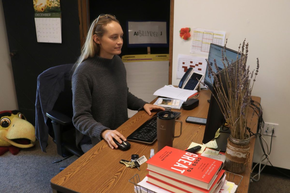 Alesha Billmeyer, Introduction to Business Management and Advanced Business Management teacher, likes to go on a morning swim before the school day. Billmeyer said that her habit of starting the day early came from running competitive track in high school.