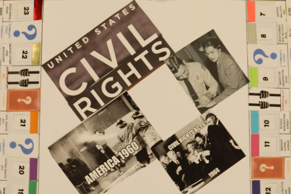 Social science teacher Austin Wade does a monopoly-style lesson about Civil Rights in his U.S. History class. Wade will teach the new Social Justice elective, which was created to offer students a class related to social movements and government laws. 