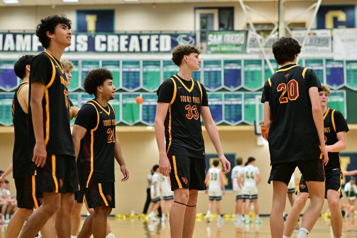 Varsity boys basketball players prepare for the California Interscholastic Federation Division II State Round 2. The team went 20-14 over the course of the season. Photo courtesy of Anna Scipione.