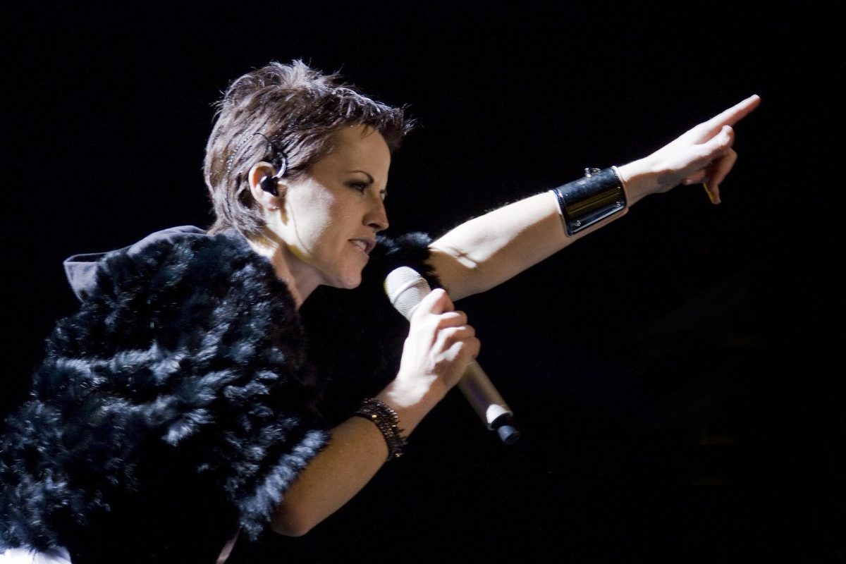 Dolores O'Riordan, lead singer of The Cranberries, sings the hit song "Zombie" to the crowd. The 90s anthem was a protest song against the conflict in Northern Ireland, but its message was often overlooked by its musicality. Photo courtesy of Creative Commons.