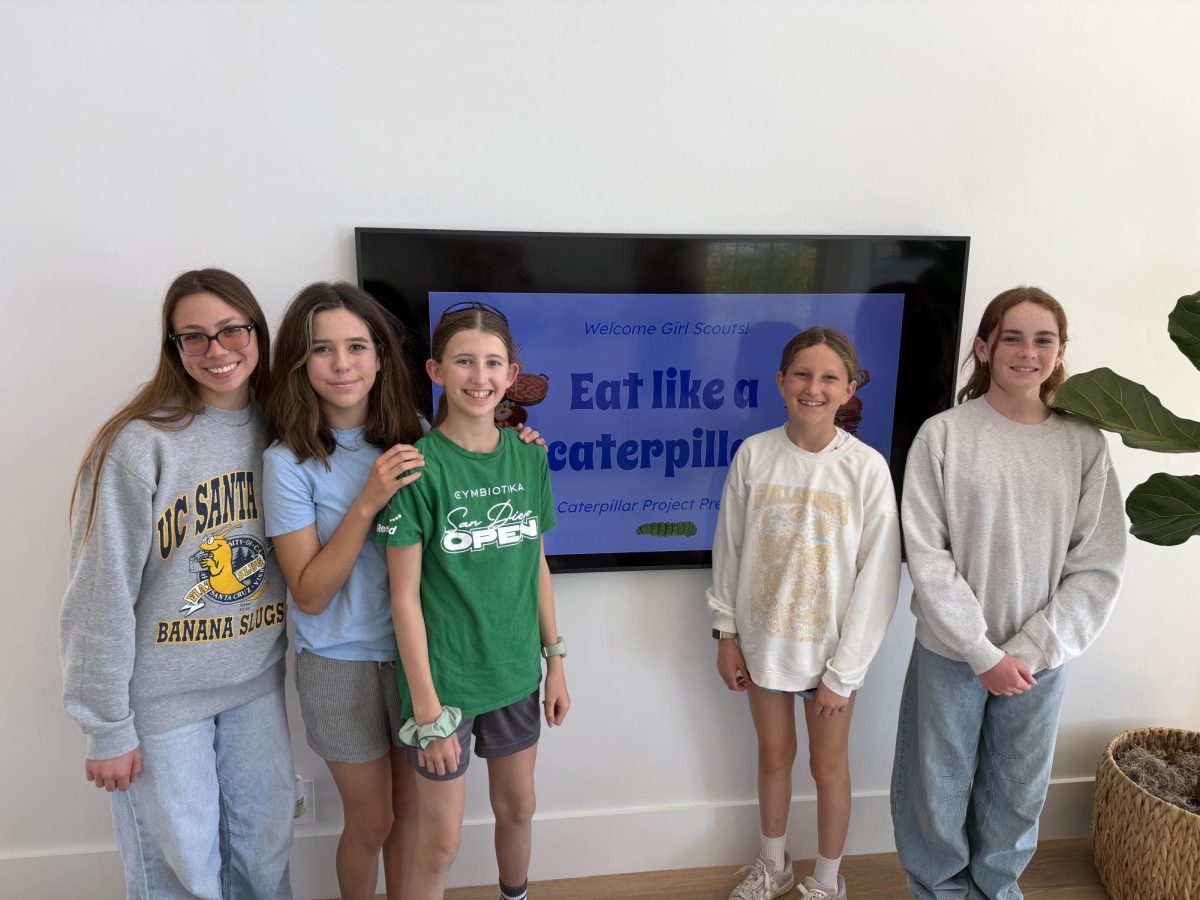 Portia Perry (11) presents the Caterpillar Project to Girl Scout troops and local sports teams. Perry also made a fueling guide for the Blue Angel Snow ski camps. Photo courtesy of Portia Perry.