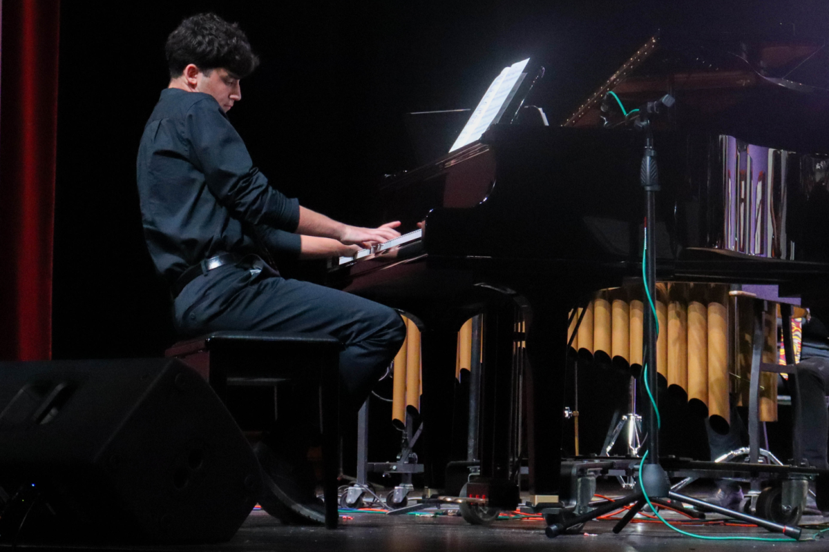 Arno Janoyan (11) plays piano during his solo at the Falcon Finale concert. Janoyan performed the jazz standard “Softly, As in a Morning Sunrise” as part of the concert.